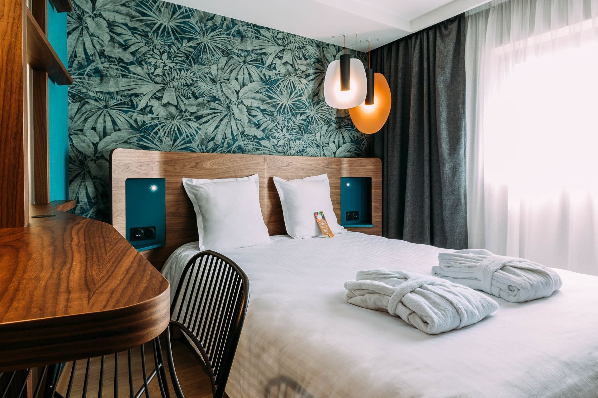 Intérieur d'une chambre à l'Oceania Paris Porte de Versailles