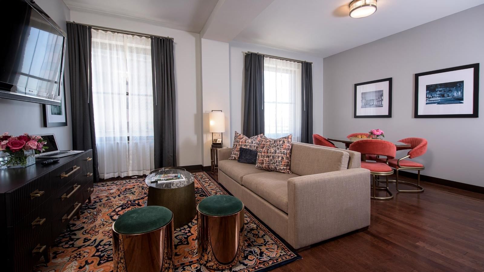 Living & dining area with TV in Studio Suite at The Mayo Hotel