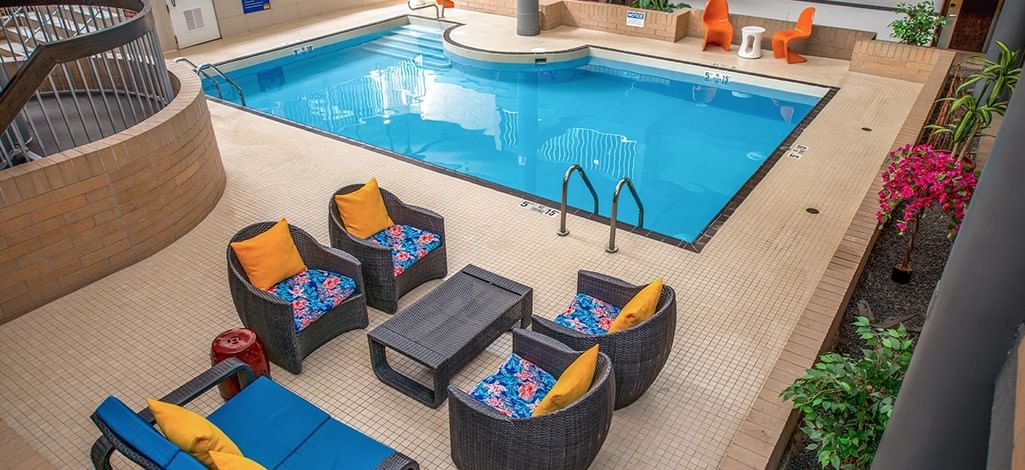 Indoor Pool at Coast Calgary University Area Hotel by APA