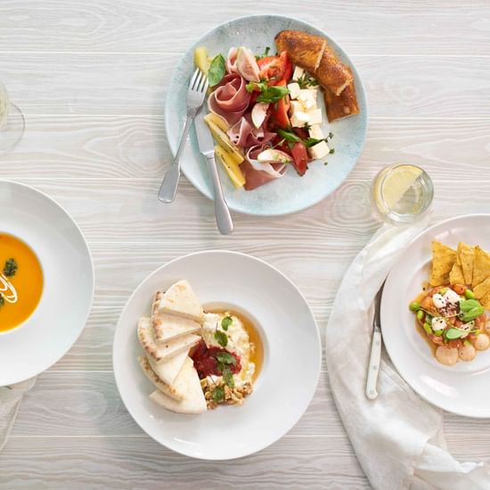 Food plates arranged in Barretts Restaurant at Pullman Magenta Shores