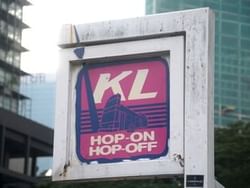 Signboard of KL Hop-on Hop-off Bus near St Giles Boulevard