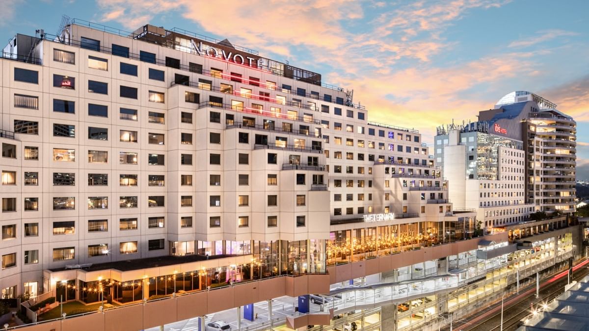 Novotel Sydney Darling Harbour building exterior with architectural design, central Sydney location, and Darling Harbour position