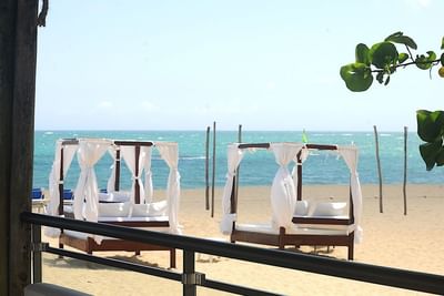 Cabanas on beach and ocean view near Blue JackTar Hotel