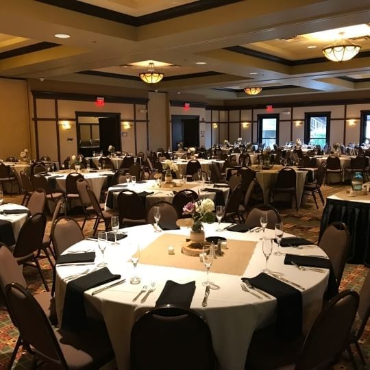 Banquet tables setup for a wedding at Chase on The Lake