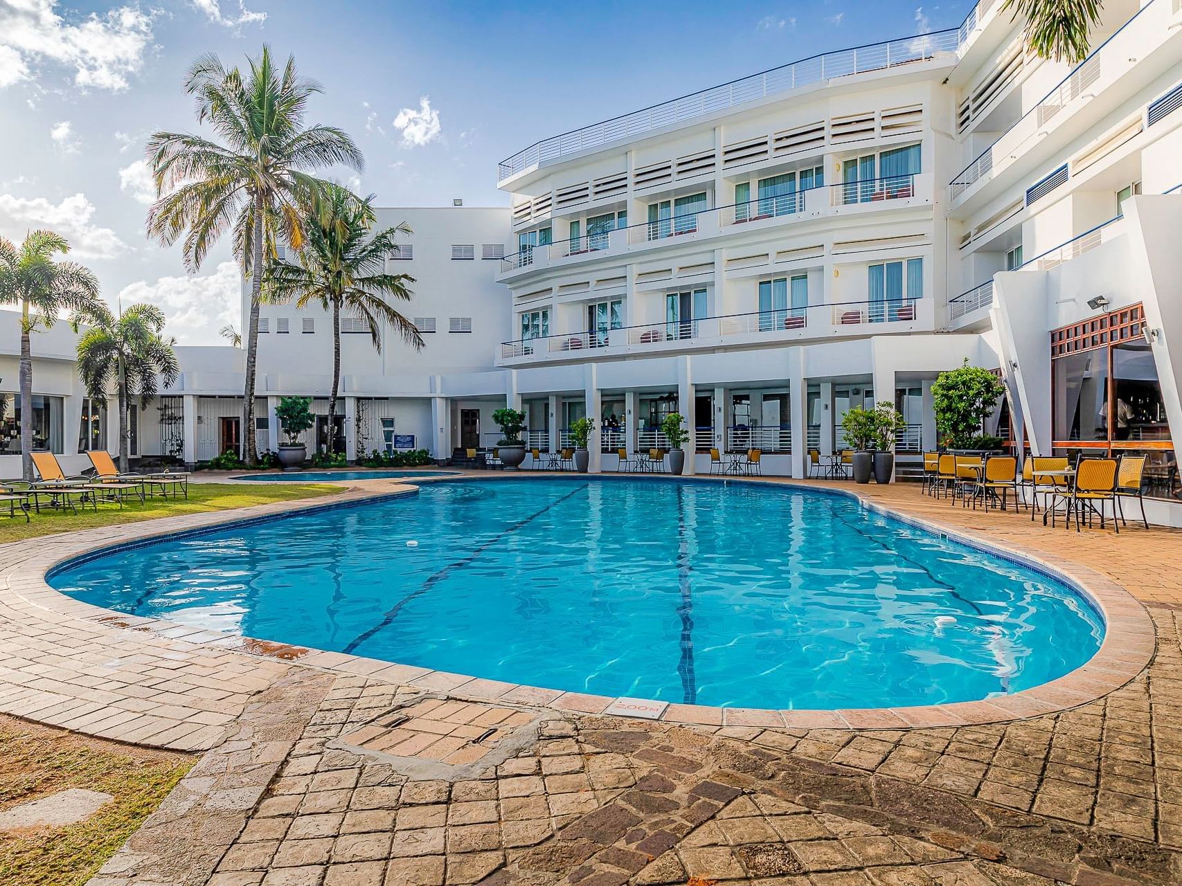 Exterior view of the hotel & outdoor pool at Cardoso Hotel