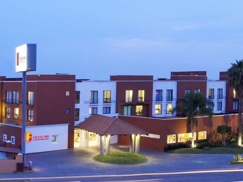 Aerial view of the entrance to Fiesta Inn Leon at night