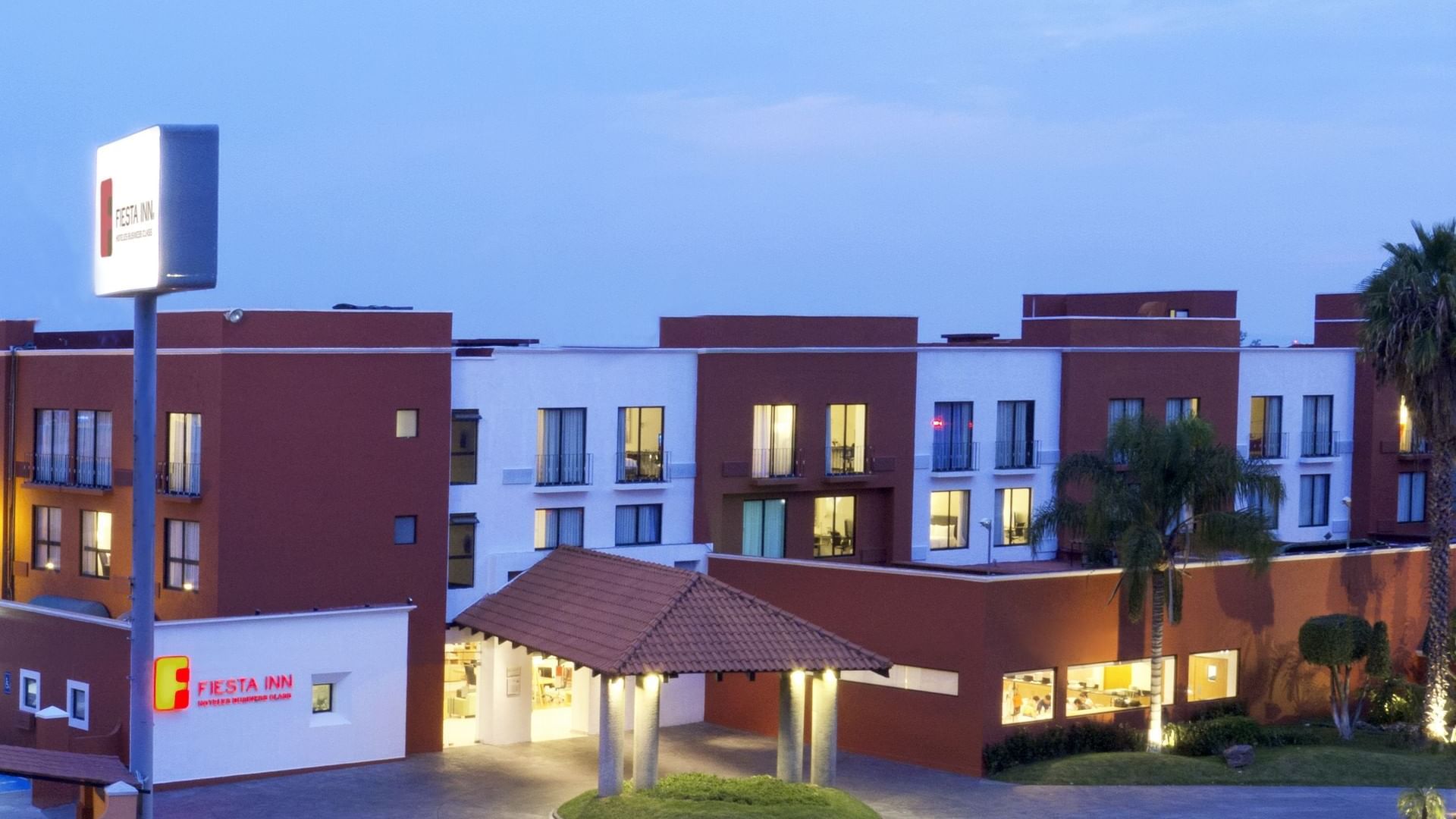 Front Exterior view of the hotel & streets at Fiesta Inn León