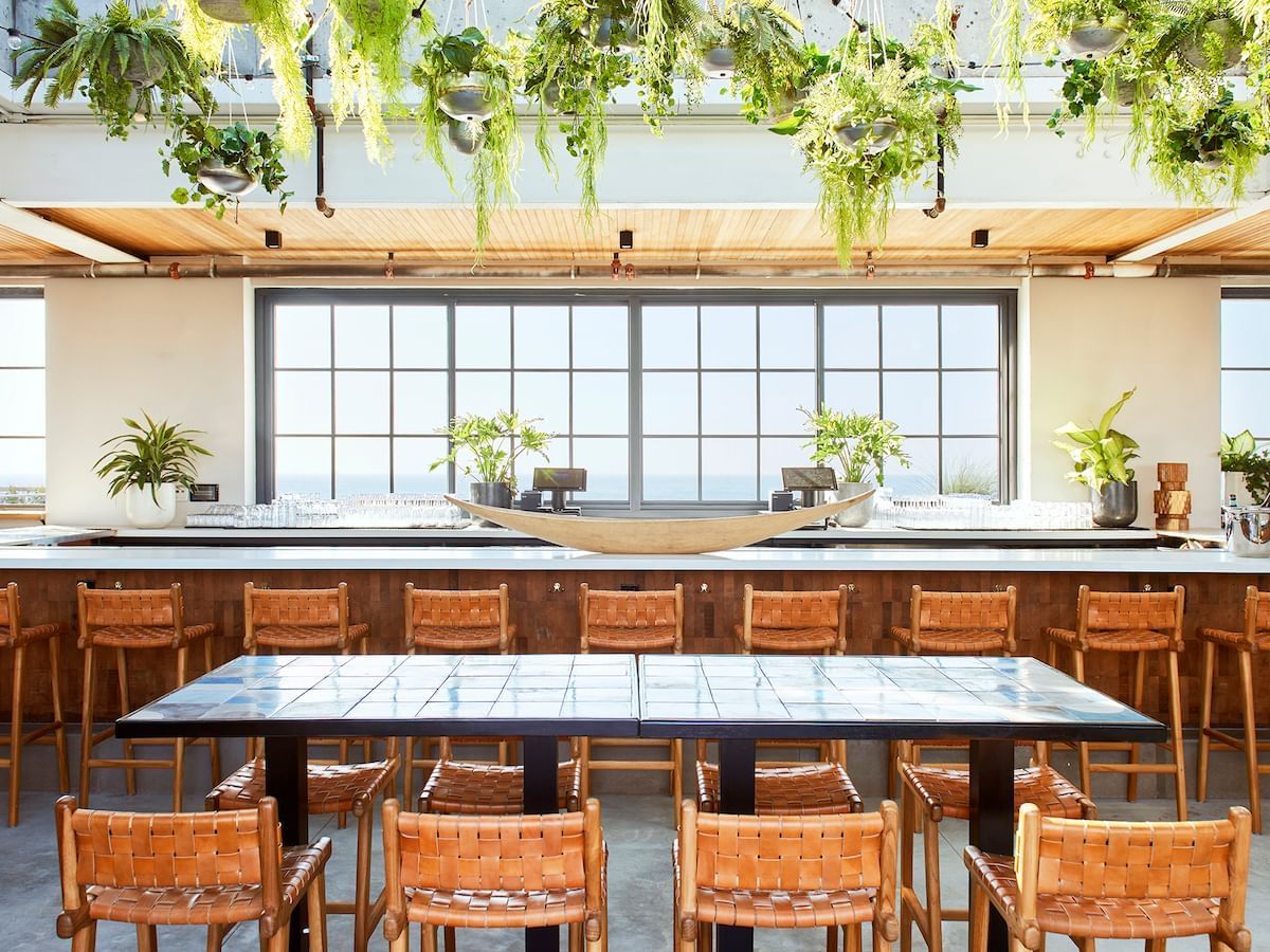 Arranged Seating area at Rooftop bar in The Rockaway Hotel