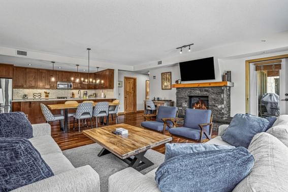 200 Rundle Cliffs Lodge Three Bedroom Premier Condo living room with a kitchen and dining area at Spring Creek Vacation