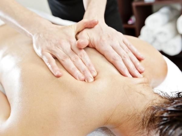 Close-up of a back massage in a spa at Grand Fiesta Americana