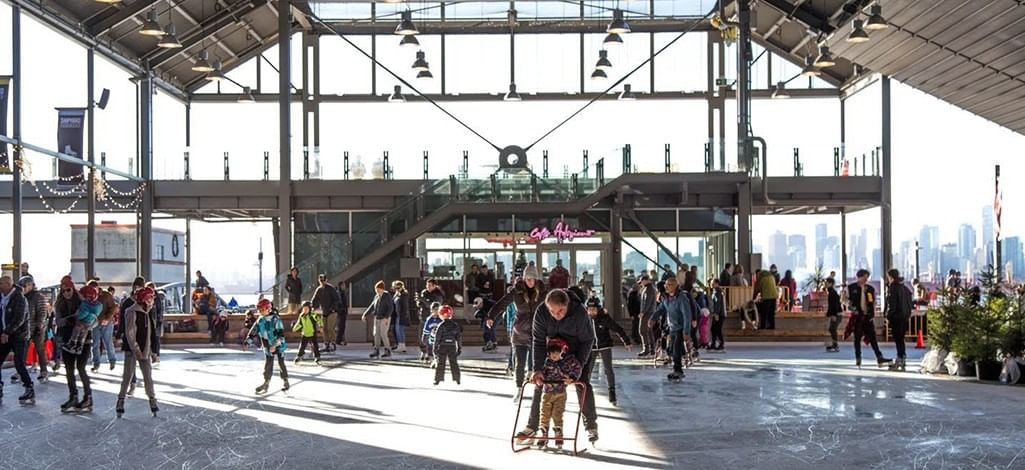 families skating at the Shipyard Commons Skate Plaza