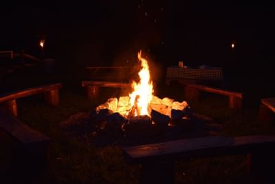 Open fire pit at night.