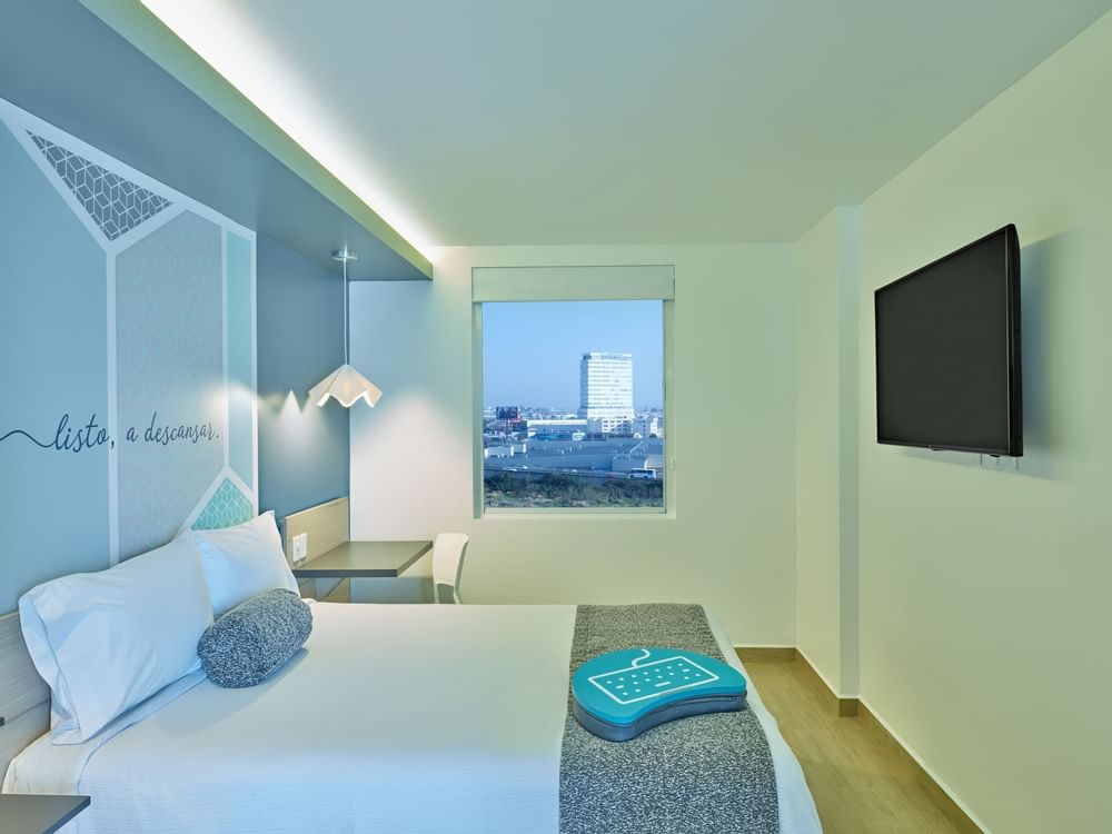 Superior One Queen Room with a Cable TV at One Hotels