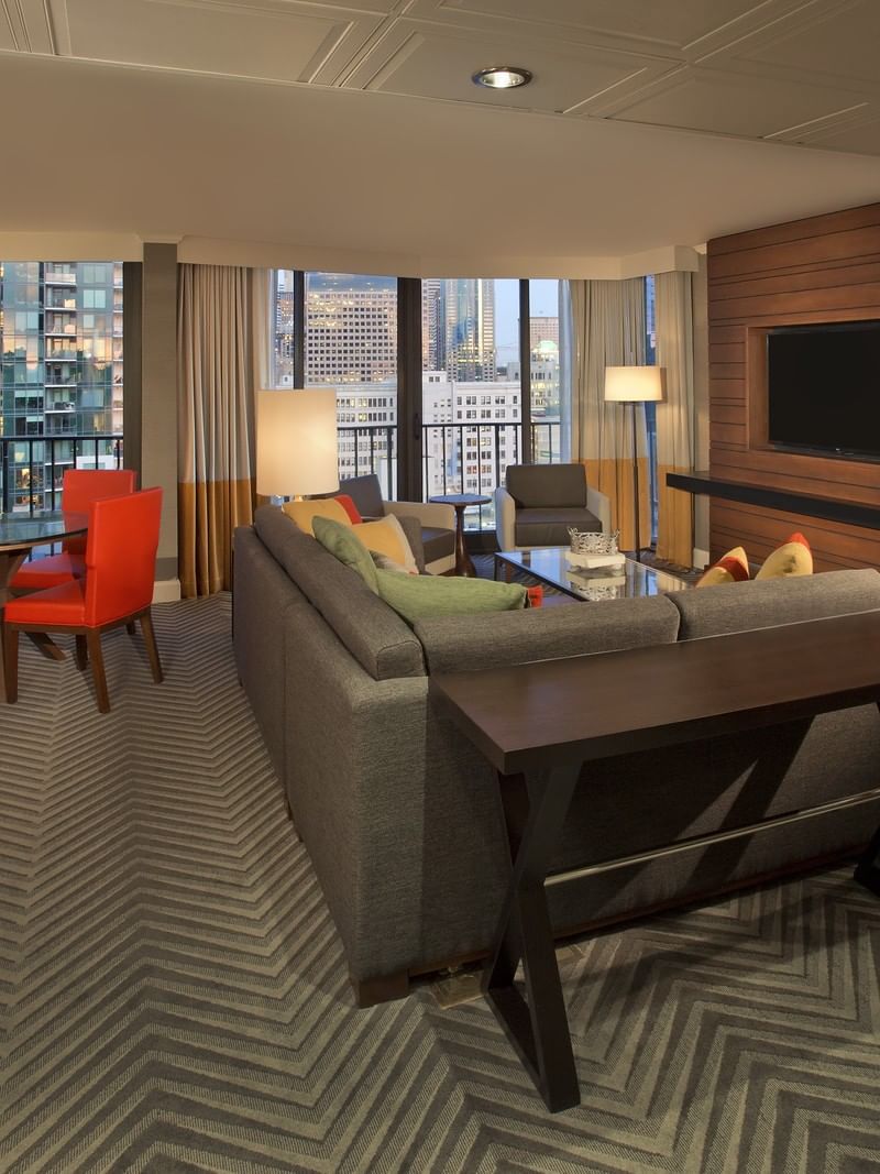 Cozy Evergreen Suite with modern furniture and city view at Warwick Seattle in Seattle.