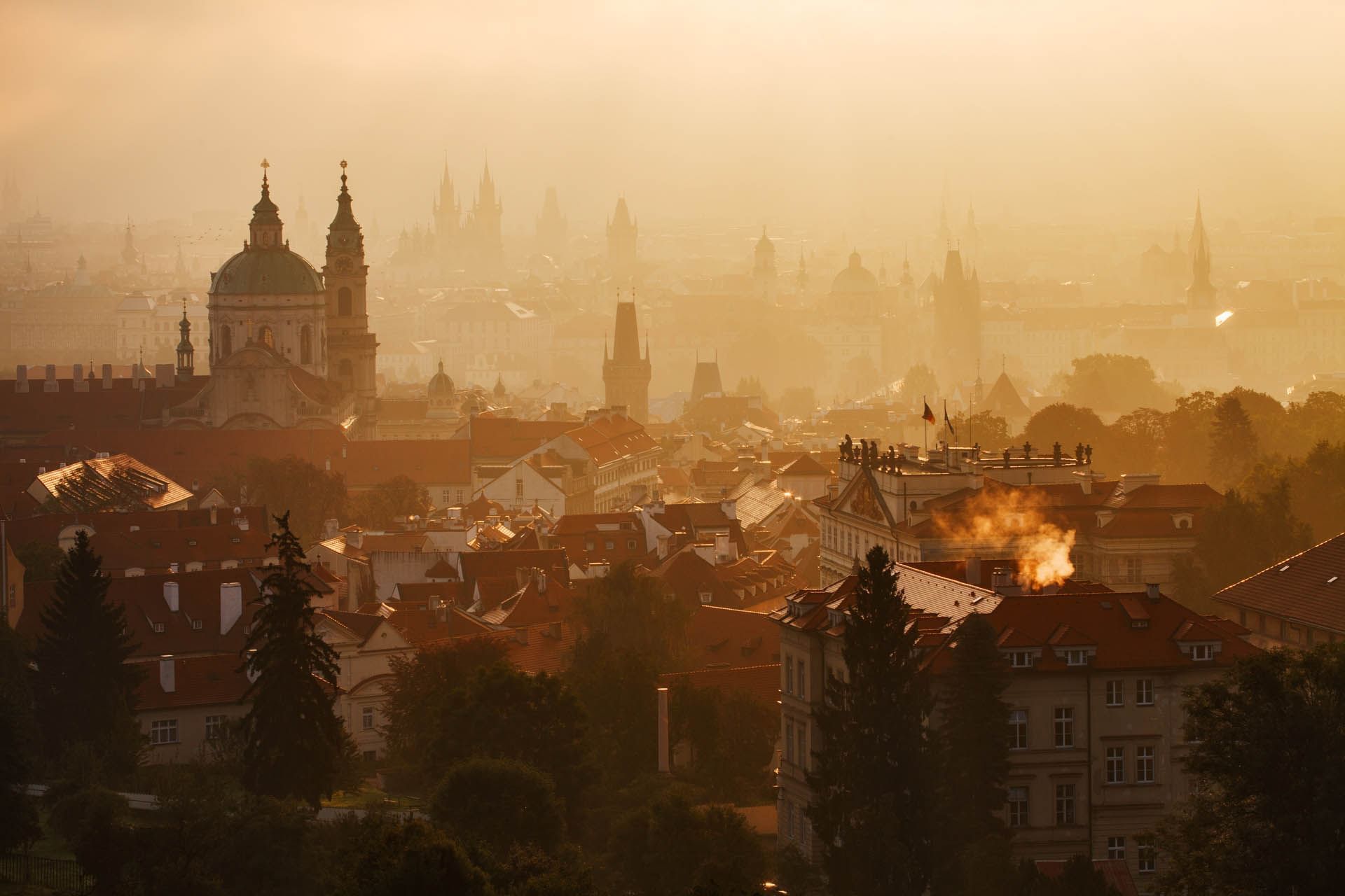 Aerial view of the Prague city with mist near Almanac X Prague