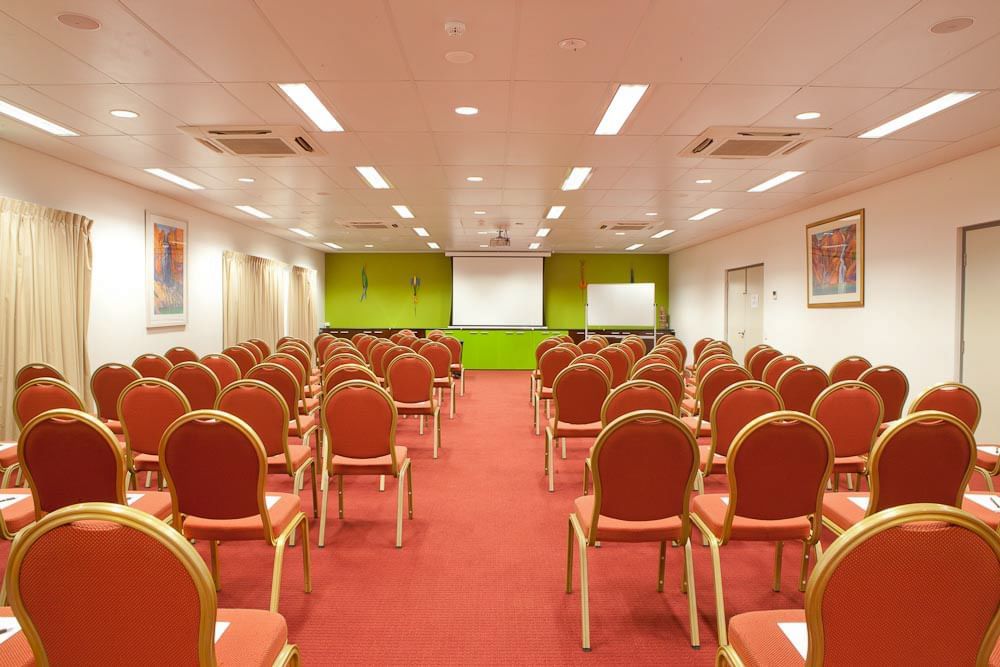 Meeting room with a projector at Darwin Airport Hotels