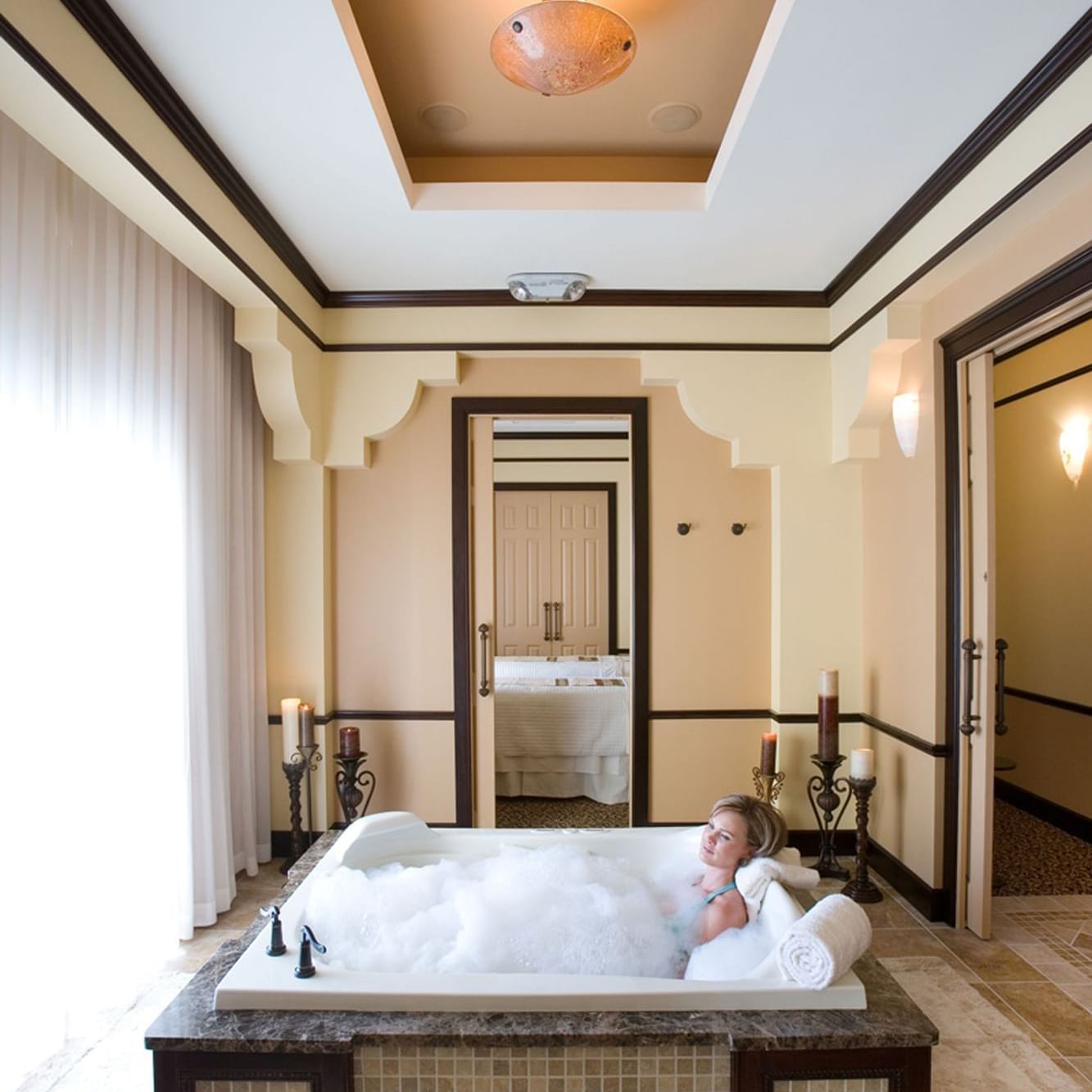 Lady having a bath in Reflections Spa and Salon at Lake Buena Vista Resort Village & Spa