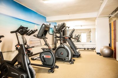 Exercise machines in the Fitness Room at The Savoy Hotel & Beach Club