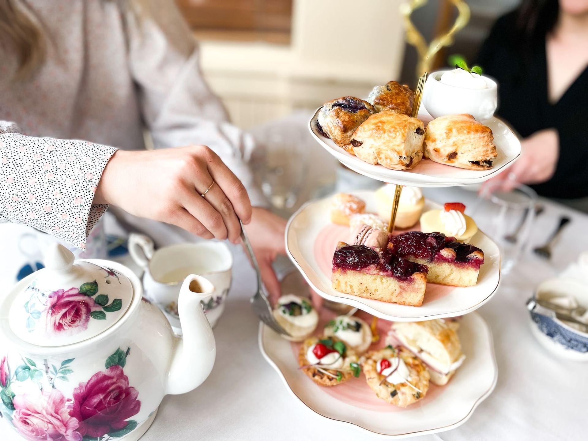 Close-up of high tea platter served in a restaurant at Hotel Eldorado