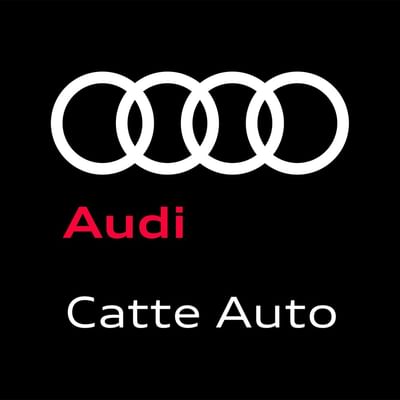 Audi logo with three interlocking rings above "Audi" and "Catte Auto" on black background.