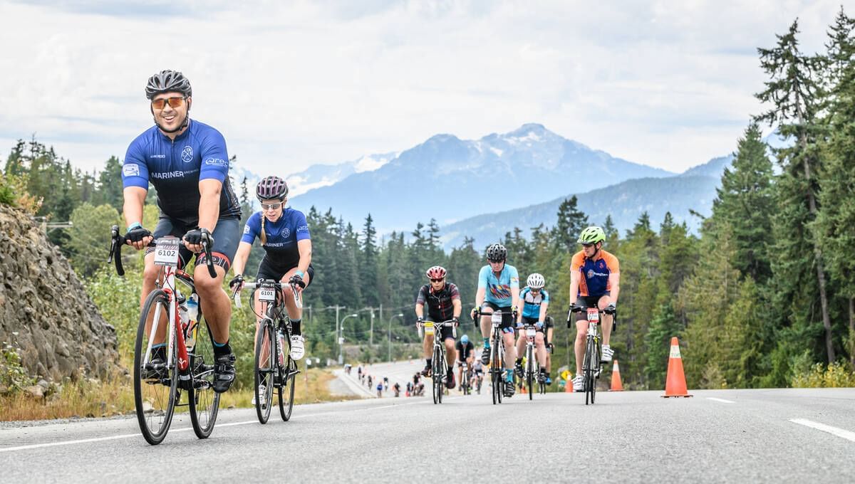 Bikers on road in a race near Blackcomb Springs Suites