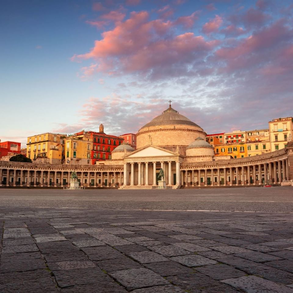 Panoramic view of the Piazza del Plebiscito at sunset near The Independent