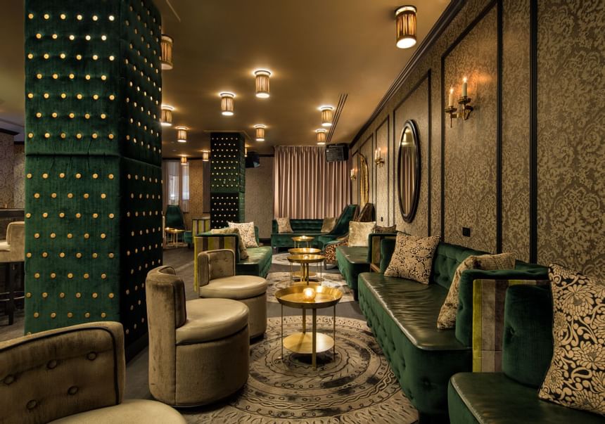 Seating area in the Rickey bar & lounge at Dream Midtown NYC