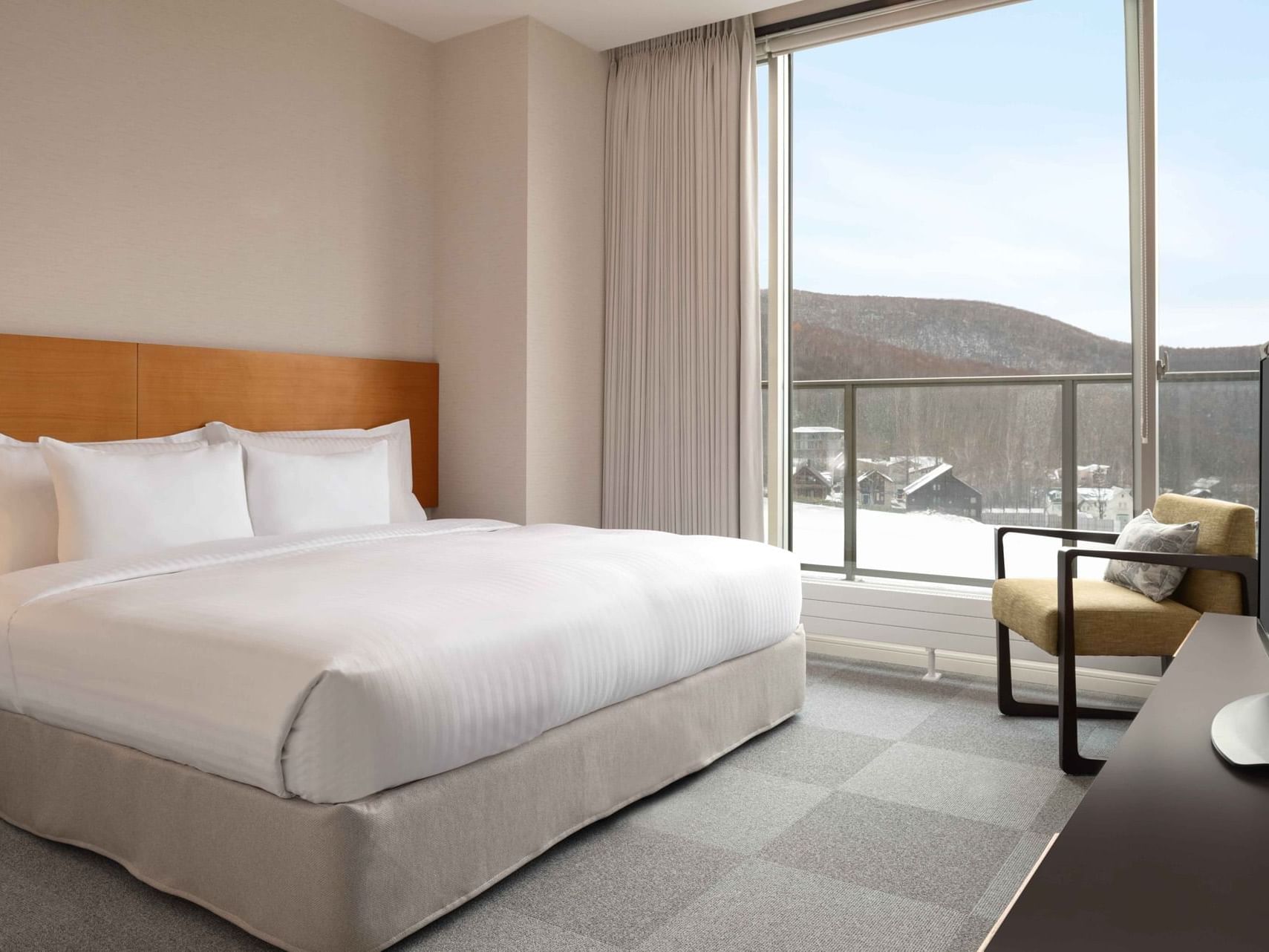 TV & bed in 2 Bedroom Penthouse City View at Chatrium Niseko