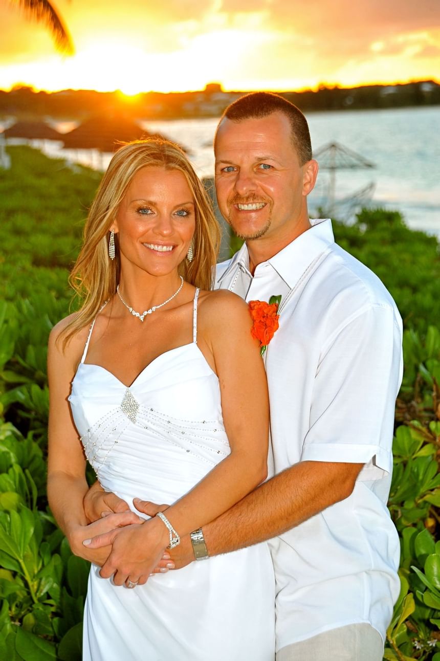 Happy Couple and sunset at Windsong Resort On The Reef