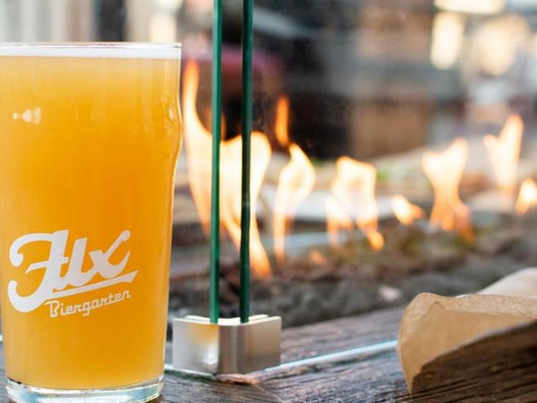 Close-up of beer glass served in Flx Biergarten at Hotel Atwater