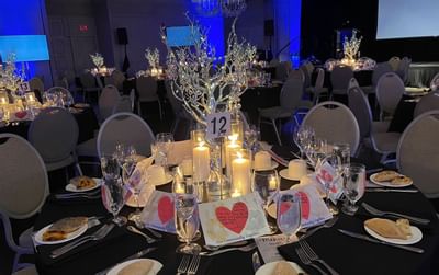 Banquet table set-up in a wedding hall at Ethan Allen Hotel