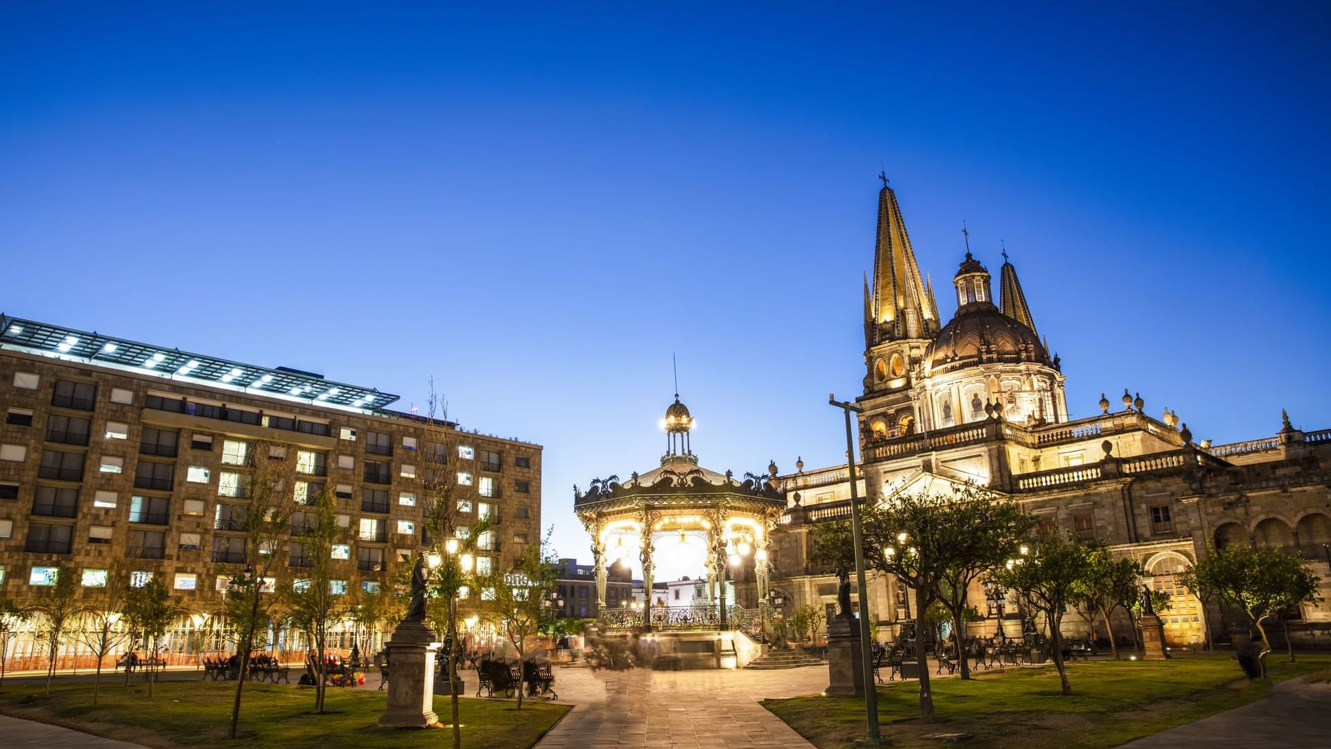 Exterior view of illuminated One Guadalajara Centro Histórico