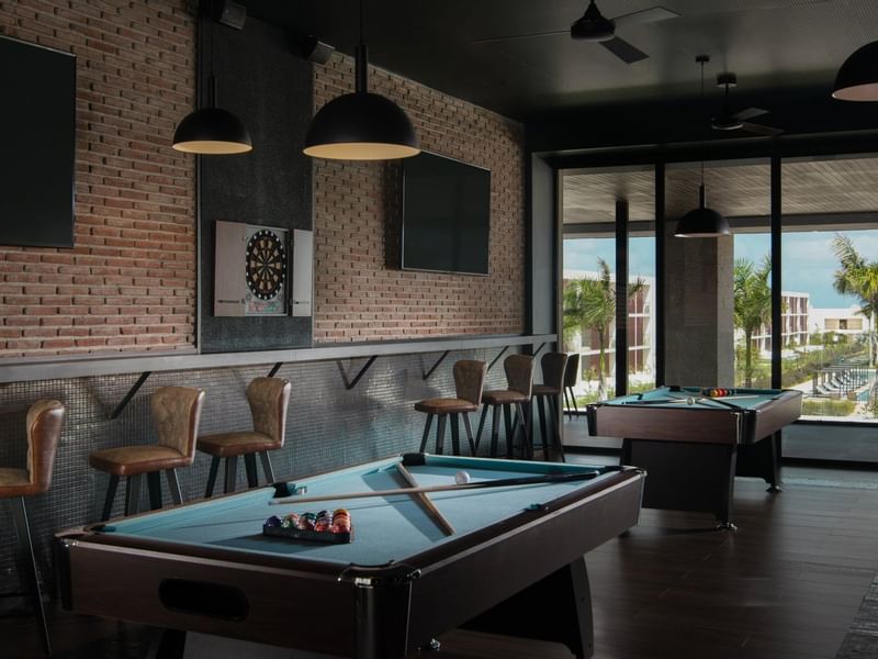 Compton ST dining area with pool tables at Live Aqua Beach Resort Punta Cana