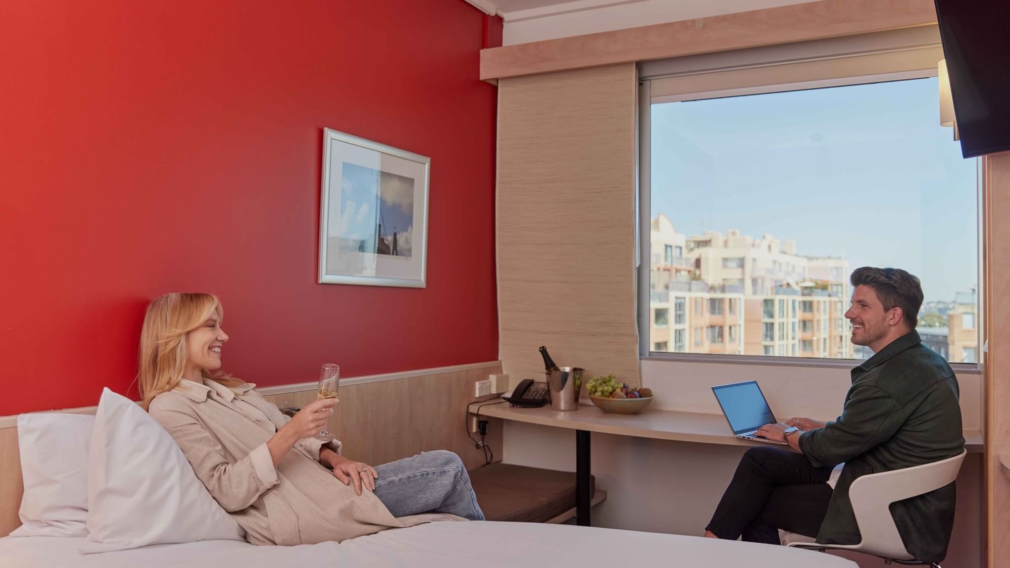 Couple in room at ibis Darling Harbour