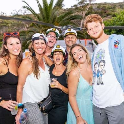 Group of people smilingly posing for a photo at Catalina Island Company