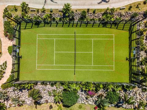 Aerial view of the tennis court at Golden Rock Resort