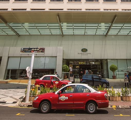 Entrance view and taxi located outside at Sunway Hotel Georgetown