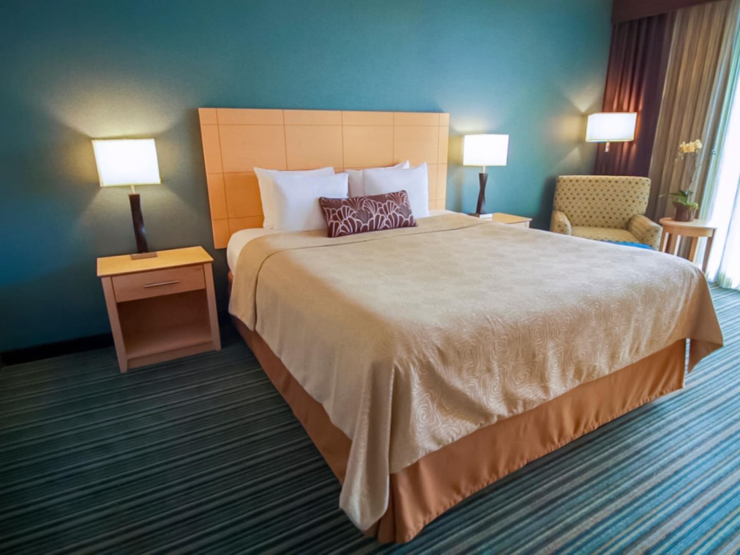 Double bed with nightstands at Inn by the Sea at La Jolla