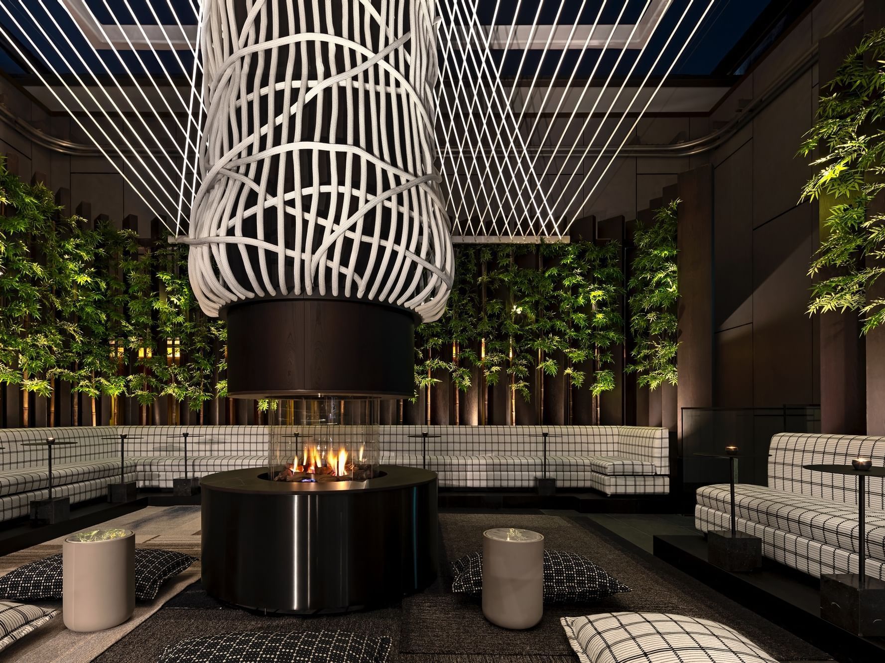 Interior of Rooftop Bar with fire pit of The Londoner Hotel