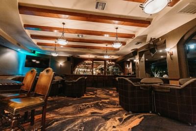 Lounge area with a TV in Lobby Bar at Araiza Mexicali