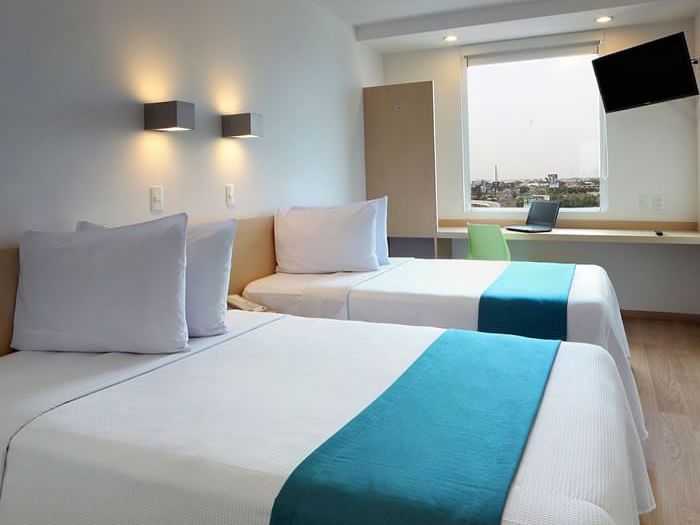 Interior de la habitación doble superior en One Hotels