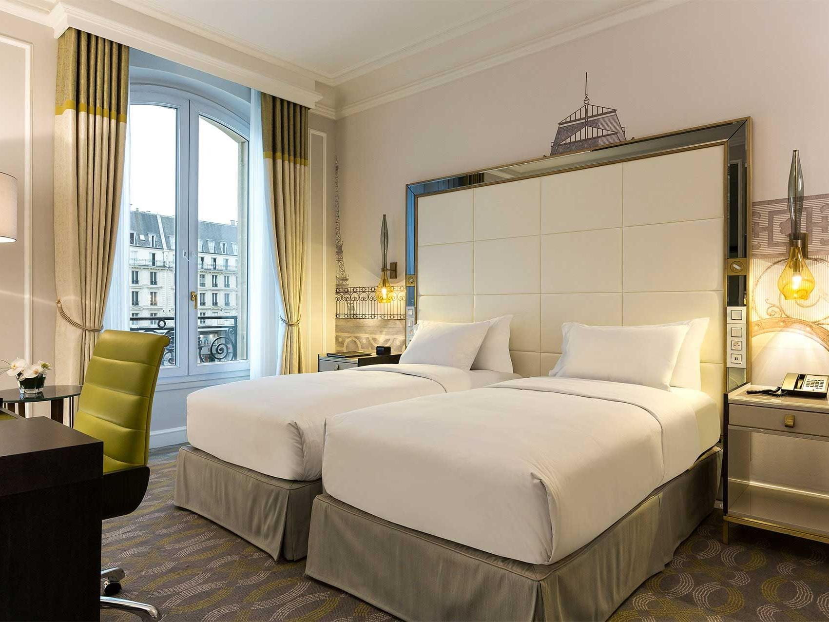 Bed & furniture in Twin Deluxe Room at Hilton Paris Opera Hotel