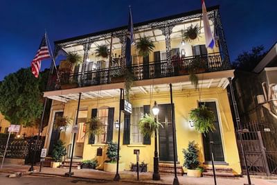 Exterior view of Andrew Jackson Hotel at night with lights