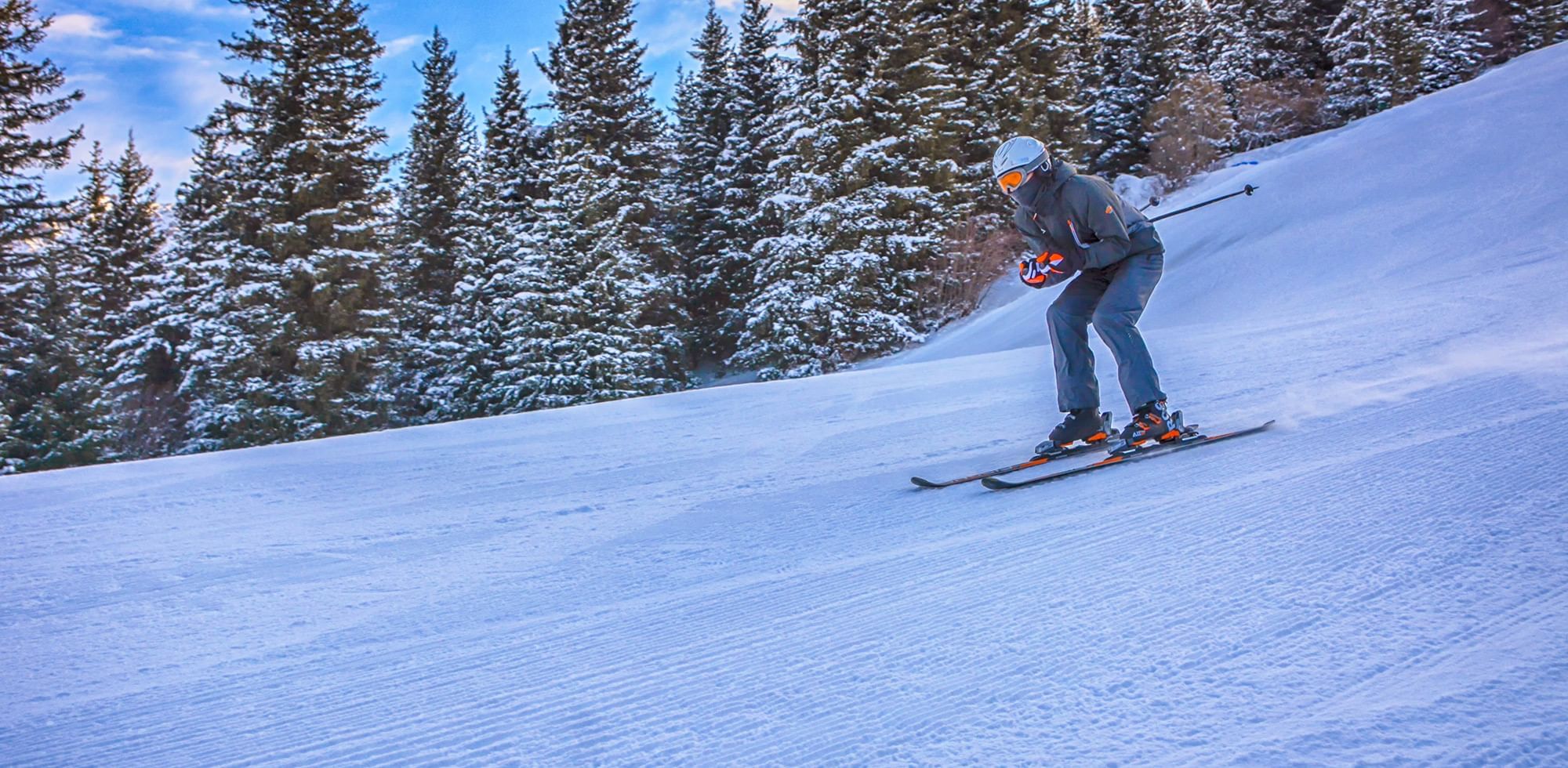 Kid downhill skiing