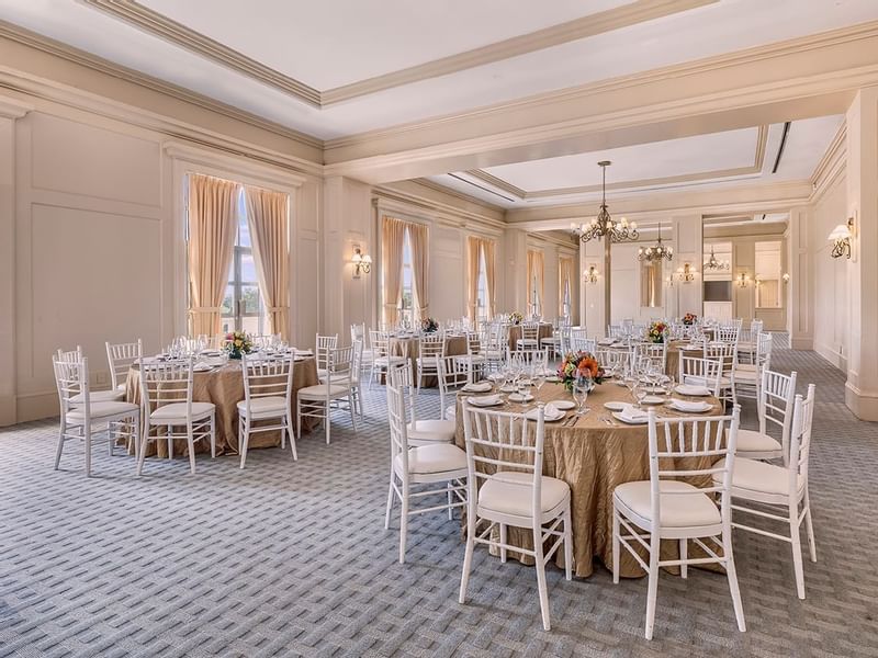 Banquet table setup in a wedding hall at FA Hotels & Resorts