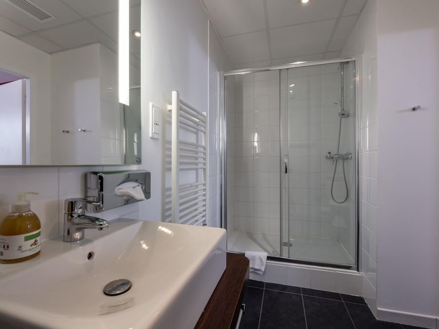 Bathroom interior in Kosy Appart Hotels at The Originals Hotels