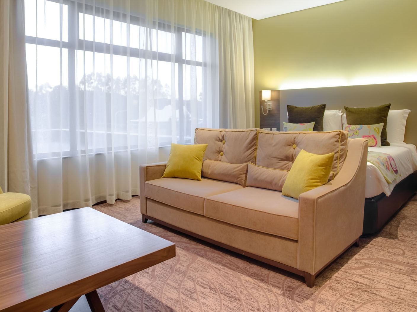 Sofa in junior suite at Tamarind Tree Hotel