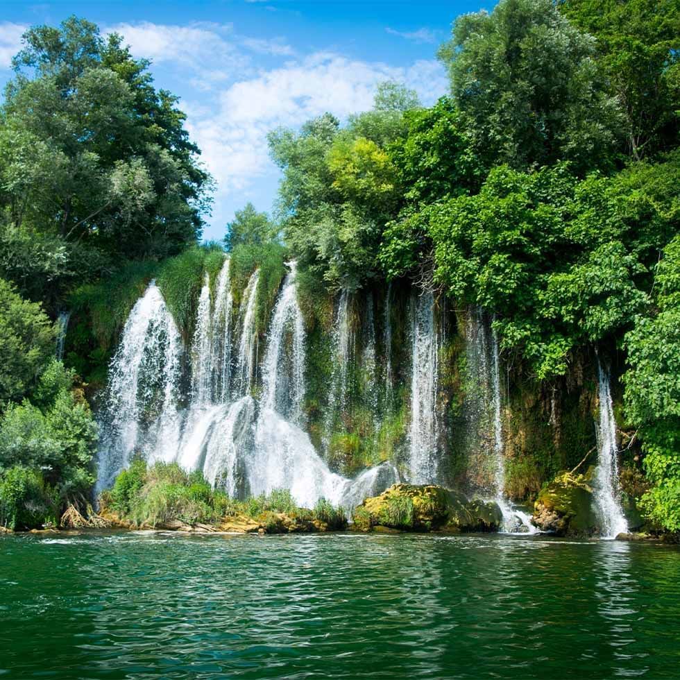 Distant view of waterfall in National Park Krka near Falkensteiner Family Hotel Diadora