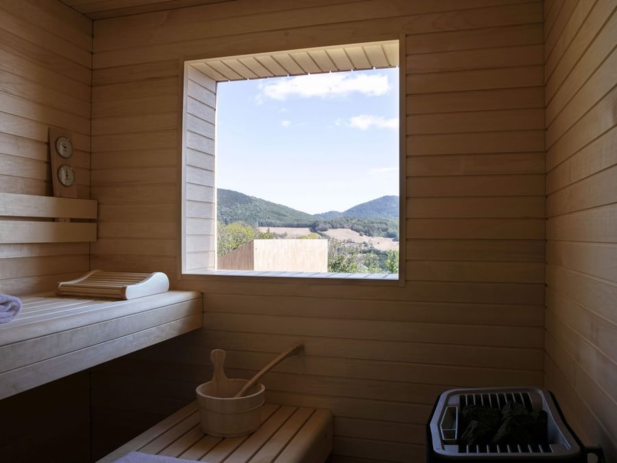 A wooden cottage with mountain view at The Originals Hotels