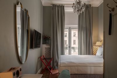Bedroom arrangement in Classique Room at The Sparrow Hotel